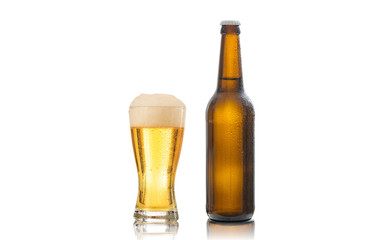 A bottle and a glass of beer isolated on white background