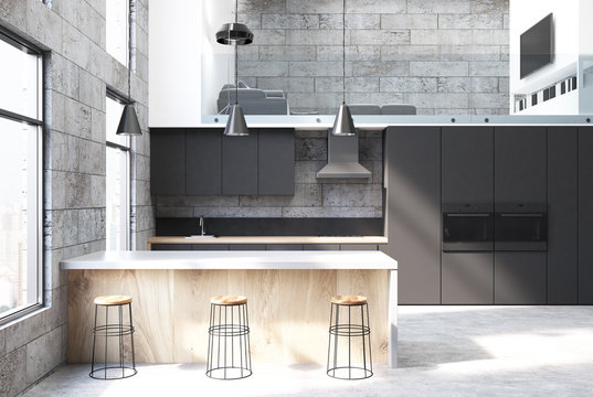 Concrete and black kitchen