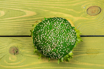 fresh green burger on green background