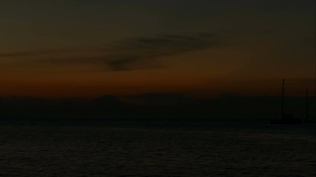 Sunset time lapse at Lovina beach, Bali