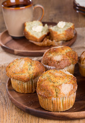Lemon Poppy Seed Muffins on a Wooden Plate