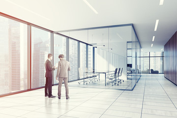 Glass, white office meeting room, armchairs toned