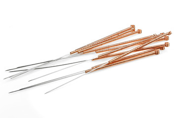 acupuncture needles isolated on white background - obrazy, fototapety, plakaty