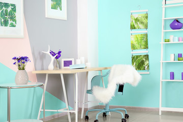 Lilac accent in modern interior. Comfortable workplace at home