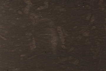 Close up of dark brown marble texture background.