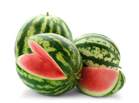 Watermelons with slice on white background