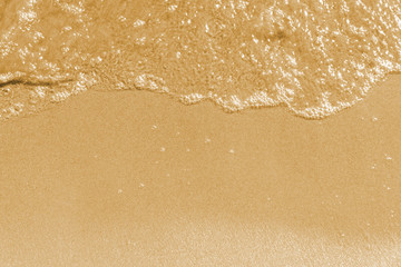 Soft waves on a sandy sea beach - top view, copy-paste