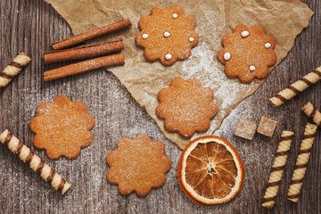 Cookies on the parchment ,top view. The Christmas sweets.