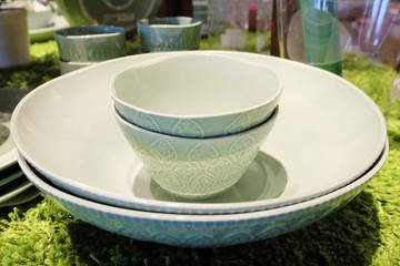 Collection of Green Ceramic Bowls and Plates