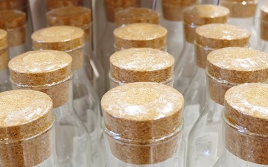 Many Empty Glass Bottles in Kitchen Store