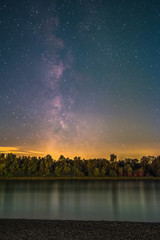 The Galactic Center as seen from the shore of the river Rhine at Mannheim in Germany.
