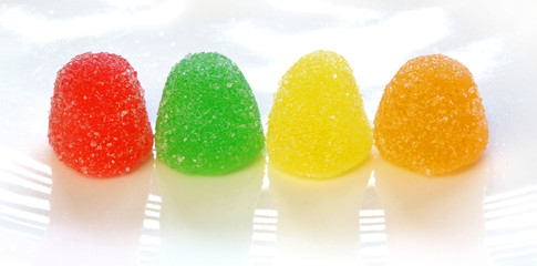 Delicious colorful gummy candies with coated crystal sugar