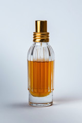 perfume in the jar on white background