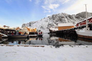 Fishermen going out on sportfishing from Nusfjord village harbor-Flakstadoya-Lofoten-Norway. 0488