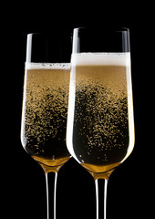 Champagne glasses with bubbles with reflection