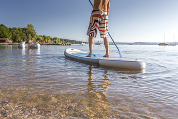 Paddler auf dem SUP-Board , Detailaufnahme
