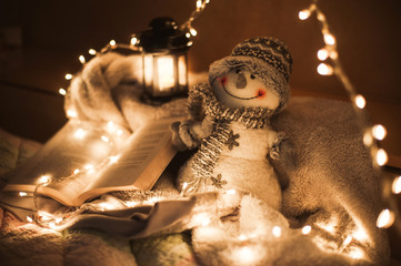 Christmas mood. Winter decoration with cookies, book and bulbs. - 178500652