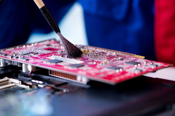 Fototapeta premium Repairman working in technical support fixing computer laptop tr