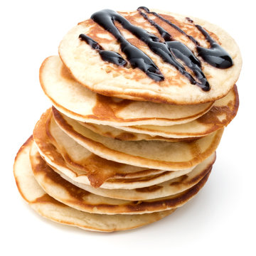 Pancakes  stack with chocolate syrup on white background