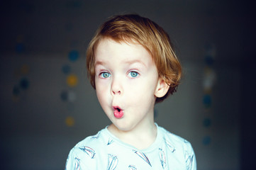 Funny little boy is wandering
