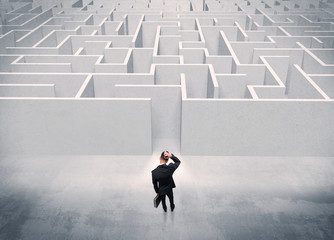 Sales person standing at maze entrance
