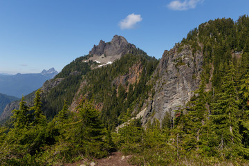 Mount Forgotten Peak and area landscape with White Chuck Mountain in the background as seen during the summer hiking season.
