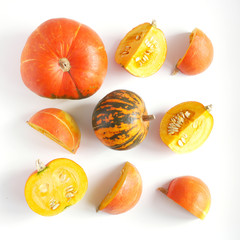 Pumpkins in a cut on a white background. Composition of pumpkins.