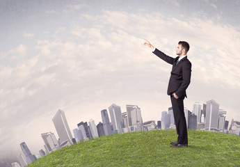 man standing in front of city landscape