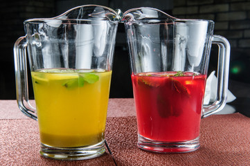 Yellow and red summer lemonade.