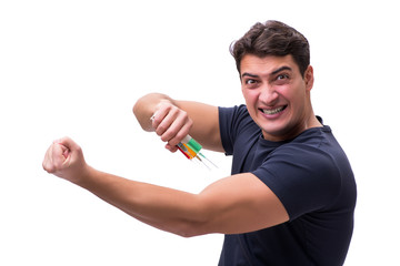 Young man in doping concept isolated on white