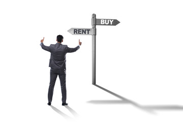 Businessman at crossroads betweem buying and renting on white