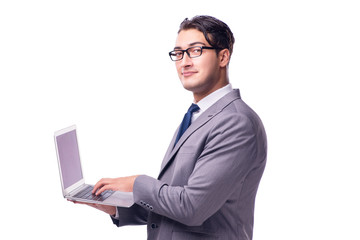 Young businessman working on laptop isolated white