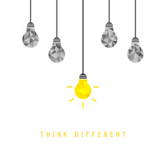 Think different concept with bright lightbulb hanging down