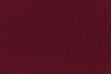 Cotton fabric of color is a tawny port. Burgundy background.