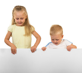 Charming girl with beautiful hair and little boy hold banner isolated on white background