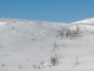 Fototapeta premium An avalanche of snow came down from the hill.