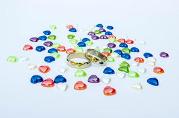 A pair of wedding rings suitable for use as a Valentine's Day background.