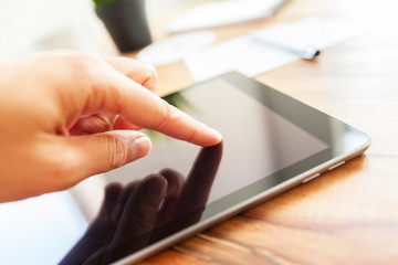 woman is working on tablet