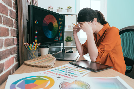 pretty young graphic design company female staff - Powered by Adobe