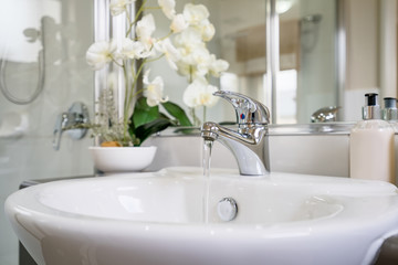 Bathroom vanity with light coloured decor in a modern Australian home.