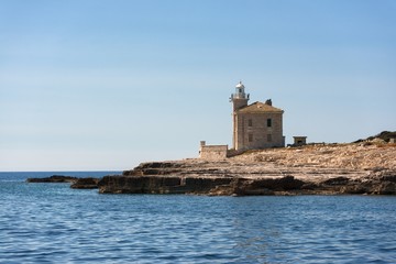 Fototapeta na wymiar Small lighthouse on the island on Brijuni, Croatia