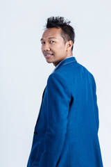 studio portrait of an asian businessman.