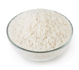 White long-grain jasmine rice in glass bowl isolated on white background with clipping path