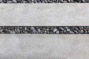 stone pebble walkway near  the swimming pool