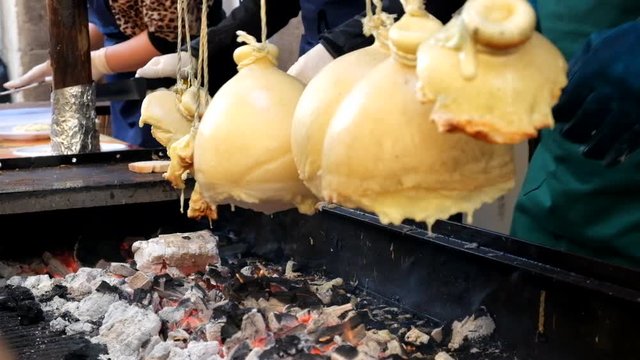 taking melted cheese on barbeque