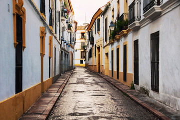 Quiet empty street in residential area of Cordoba, Spain