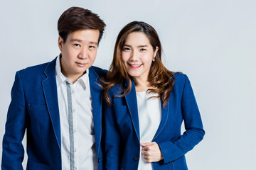 asian businessman and woman photoshoot in studio isolate background