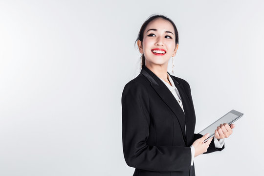 asian business woman with action pose in studio with white background