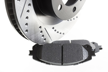 brake discs and pads on a white background