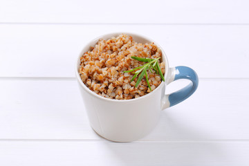 mug of cooked buckwheat